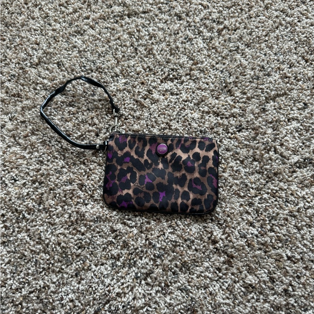 Coach leopard wristlet.